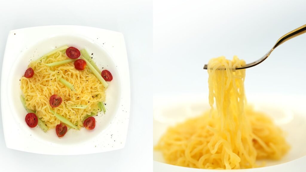 Cooked pumpkin konjac shirataki noodles served in a bowl, low-carb plant-based pasta ready to eat