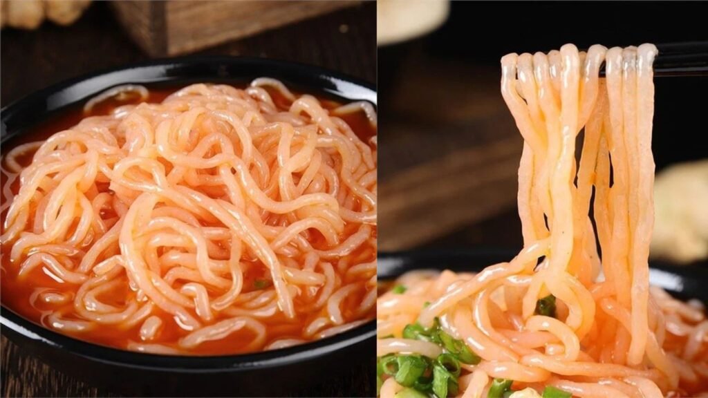 Cooked tomato konjac shirataki noodles served in a bowl, low-carb plant-based pasta ready to eat