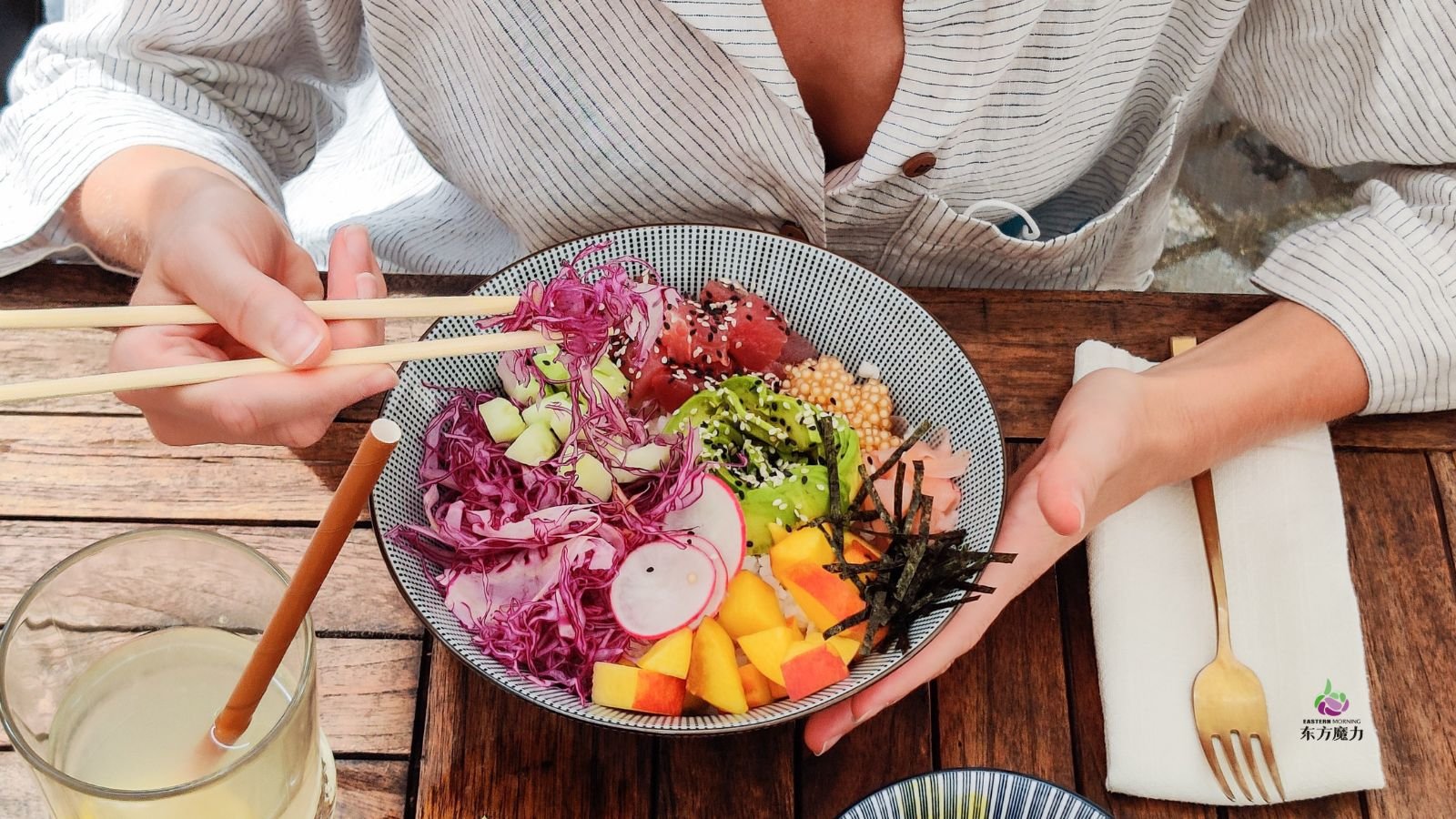 person eating a bowl of konjac rice with vegetables
