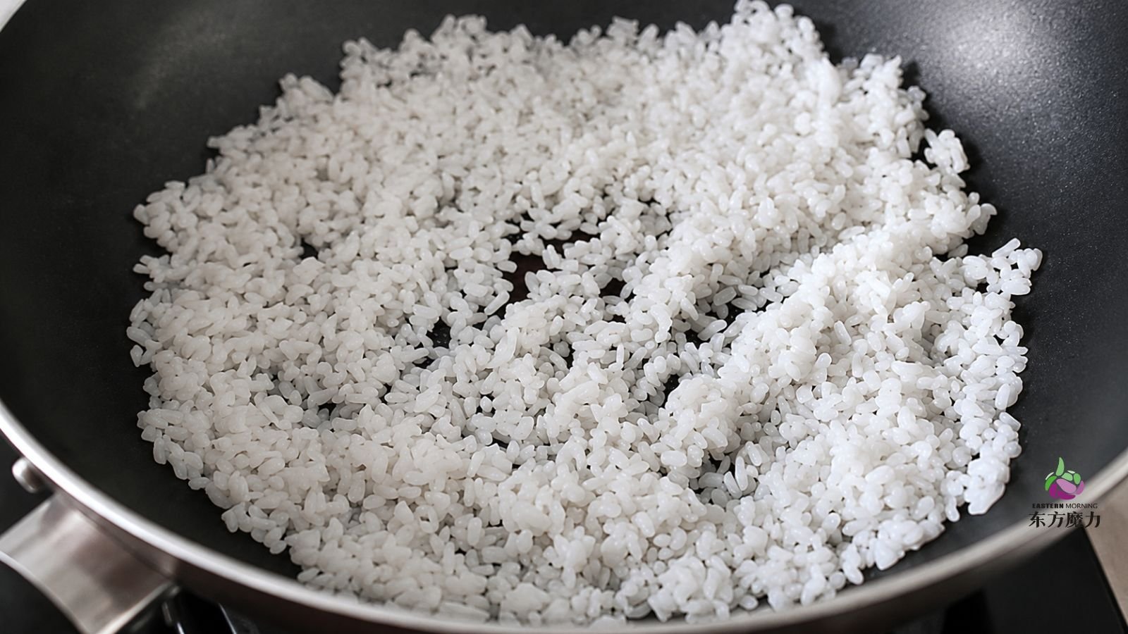 dry-frying konjac rice in pan